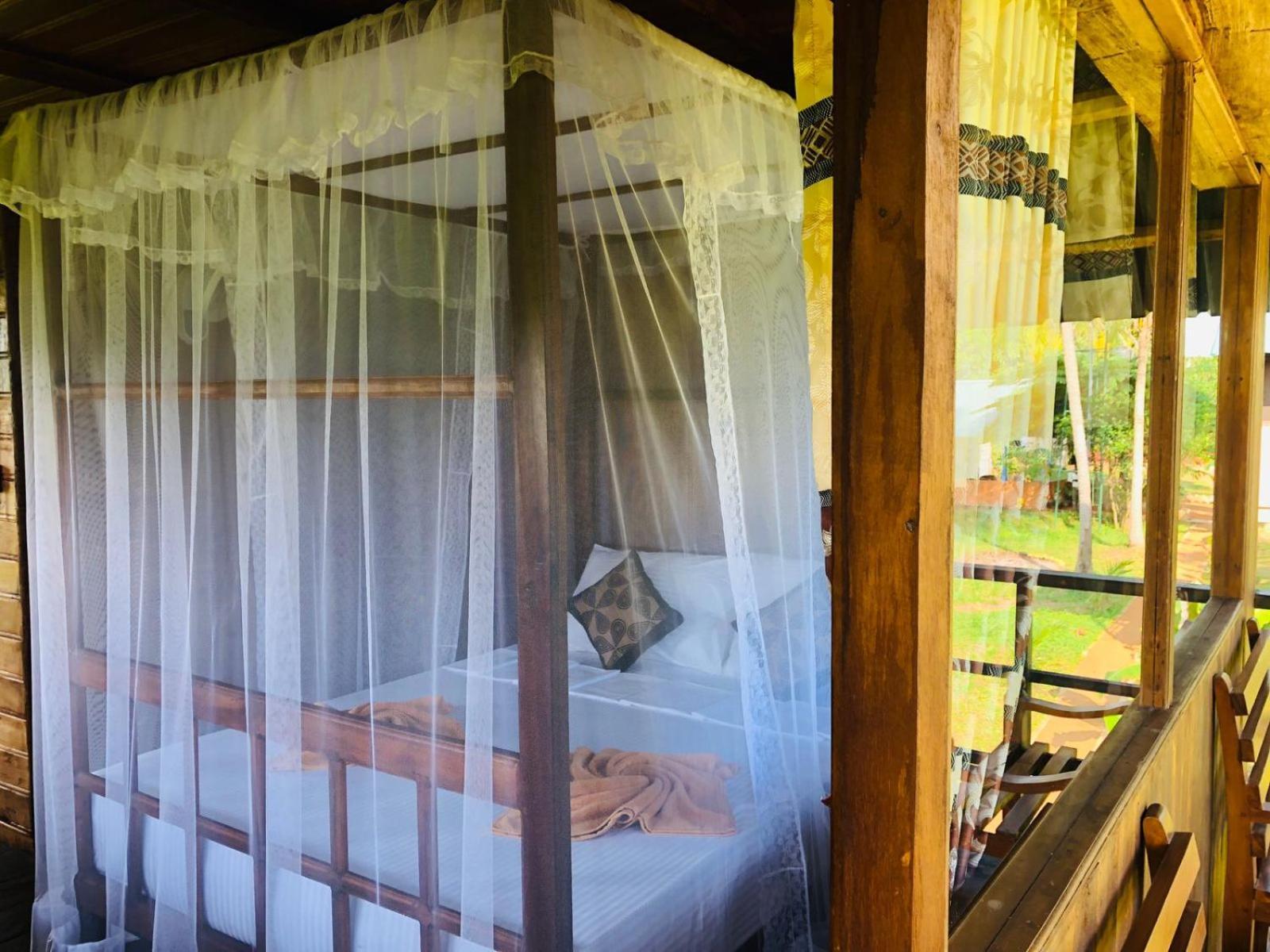 Sigiriya Paddy Field Hut Villa Room photo